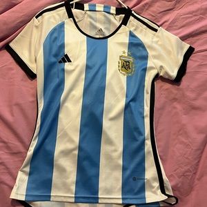 New! Without tags, womens Argentina soccer jersey size large.